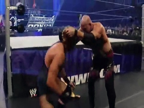 Big Show Chokeslams Jack Swagger Through Announce Table