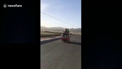 Driver gets caught bundling 13 people onto 3 seat vehicle