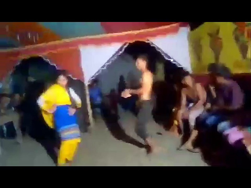 Boy and Girl Dancing in a Wedding PArty