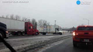 Truck slips and slides on icy road, causing crash-A4Fq5DFT_Ww