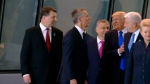 Trump shoves fellow NATO leader aside on his first summit