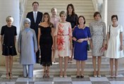 The first gentleman! Husband of Luxembourg's gay Prime Minister joins the NATO WAGs including Melania Trump