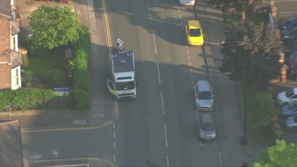 Aerials show bomb disposal van and robot in Wigan