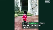 Queen's guards break formation for little boy-M_wNqxOxB44