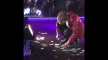 170526 Taehyung picking fake money on stage Wings Tour In Sydney