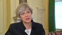 Theresa May: UK security threat level lowered after 'significant police activity'