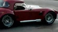 GIRL CRASHES COBRA