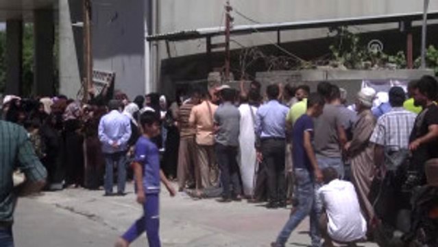 Ihh, Musul'daki Çatışmalardan Kaçan 900 Aileye Yardım Kolisi Dağıttı