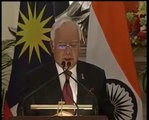 Narendra Modi in new Look fessdfdwith PM of Malesia in a Joint press conference   latest