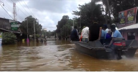 Sri Lankans Commute by Motor Boats Amid Flooding