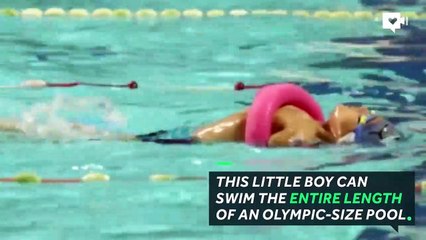 Six-year-old boy uses his feet for daily act