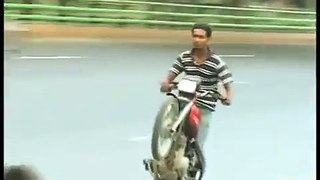 Lahore Police arreste naked one-wheeling Biker