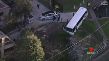 Bus in Dangling from a cliff edge after it crashed at FRESHWATER