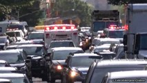 Ambulance responding with air horn, priority siren, peace sign & FDNY EMS assis