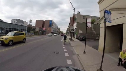 Motorcyclist turns right on red when we have right of way, cuts off cyclist in b