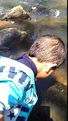 Cute kid playing with water