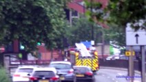 Ambulance & Fire engines responding with siren and lights in