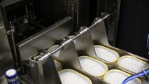 Shrink Wrapping Tapered Dairy Cups On Pads in Tw