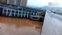 WATCH  Two Boats crash into a Bridge in China after being swept away by flood wat