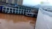 WATCH  Two Boats crash into a Bridge in China after being swept away by flood