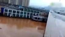 WATCH  Two Boats crash into a Bridge in China after being swept away by flood wa