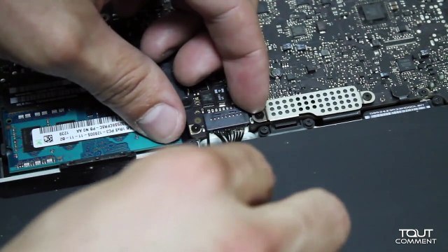 Comment changer le disque dur de mon Ma