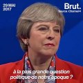 a première ministre britannique Theresa May bousculé par un journaliste