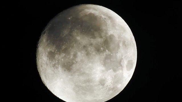Clouds rushing across the face of an almost full Moon early hours 27 Sept 2015