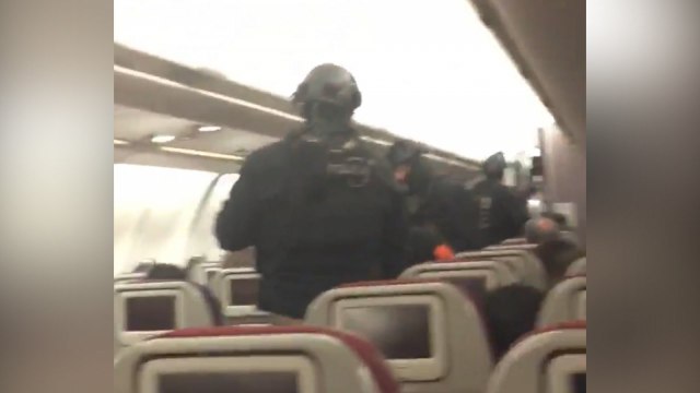 Armed police storm Malaysia Airlines plane after bomb threat