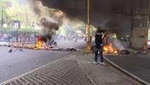 Protesters Block Caracas Roads With Debris Fires