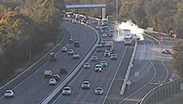 Terrifying Moment Truck and School Bus Nearly Collide on Sydney Highway