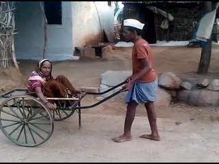 Man Takes His Mother To Hospital In Water Cart at Koppala