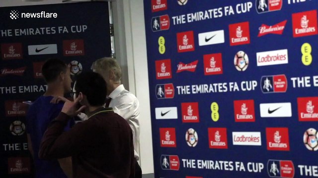 Arsene Wenger spotted talking to John Terry