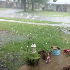 Hail Slams Into Floodwaters in Mesquite