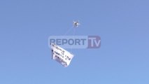 Report TV - PD ngre mbi Kryeministri dronin me banerin për zgjedhje të lira