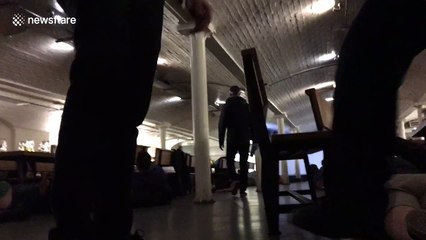 Bar customers on floor as armed police clear area