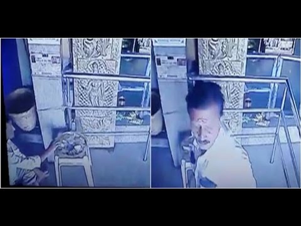 thief steals money from temple's arathi plate :video goes viral