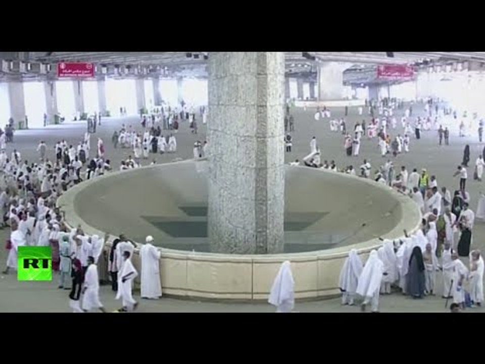 Muslim worshippers stoning devil during Hajj pilgrimage