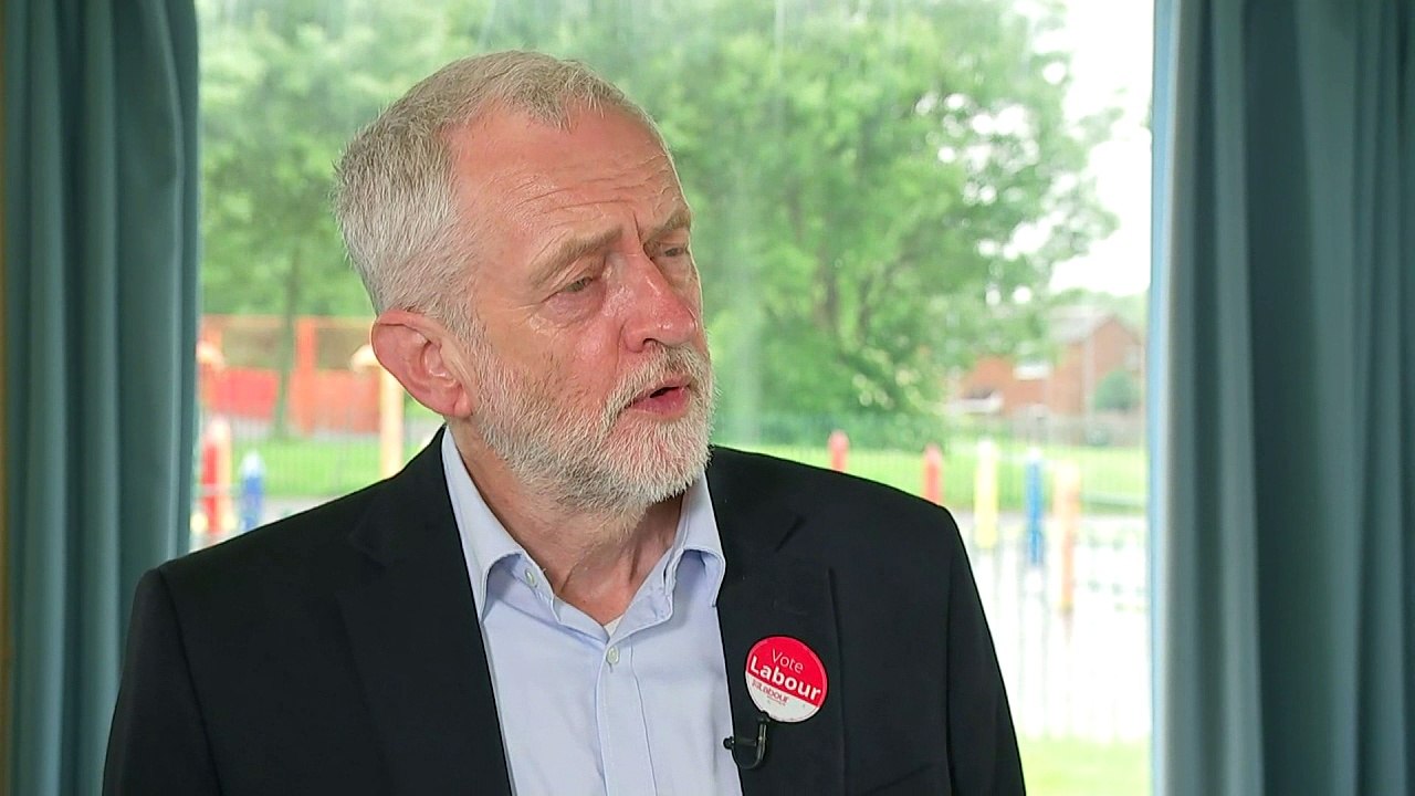 Corbyn backs calls for May to resign over police cuts