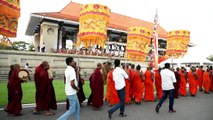 Sri Lankan Buddhist monks attend ceremony for flood victims