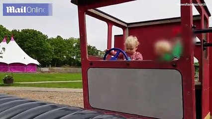 Toddler's hilarious outburst as he pretends to drive leaves his father with a few questions to answer