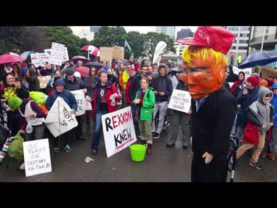 Demonstrators Hurl Water-Filled Condoms at Trump Effigy Amid Protest During Tillerson Visit