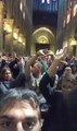 Tourists Hold Hands in Air During Lockdown Inside Notre Dame Cathedral