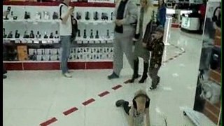 Little Kid Rocks Out at Store