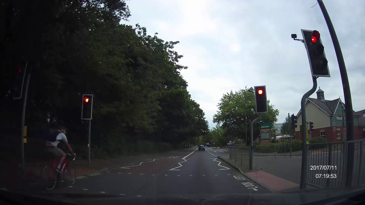 Bike jumps two red lights