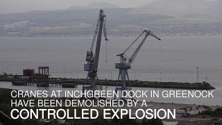 Cranes demolished by controlled explosion