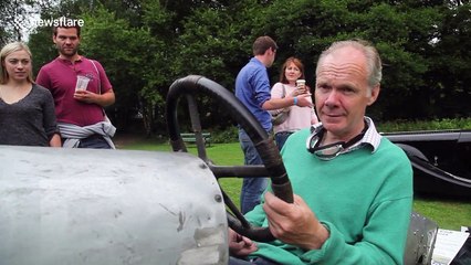 Drivers in classic cars race up UK hill