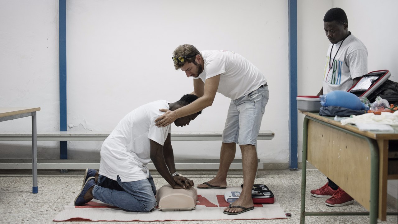 CPR and swimming lessons for migrants traumatized by crossing