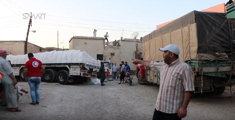 Download Video: International Aid Convoy Arrives in Opposition-Controlled Northern Homs Province