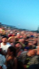 Guy Threatens To Jump Off Concert Stage Roof